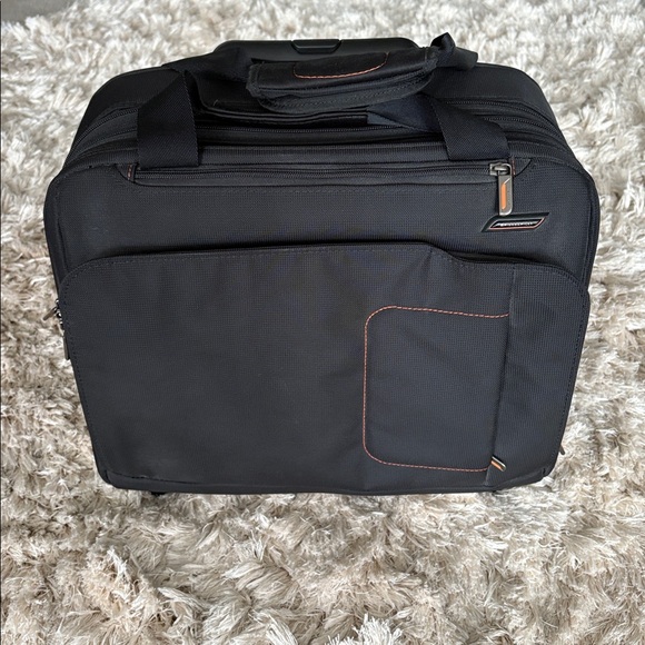 Briggs & Riley Black Bag with Vibrant Orange Interior - Picture 1 of 12
